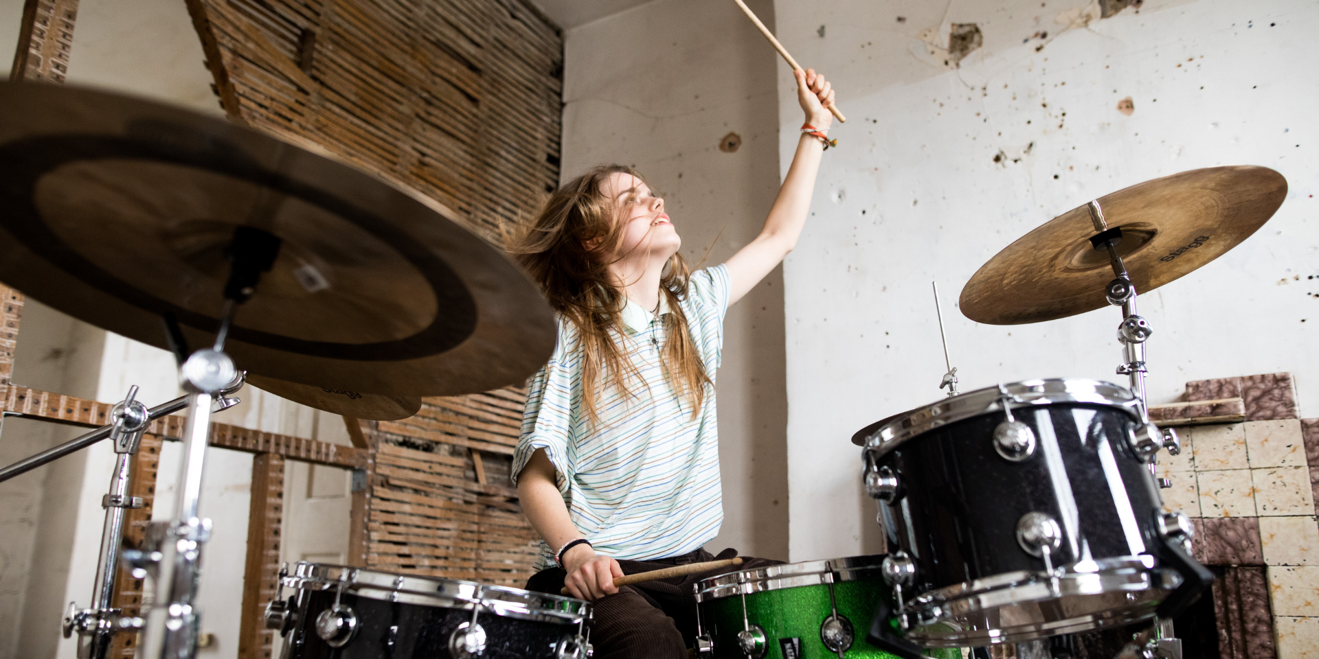 Girl at drum kit